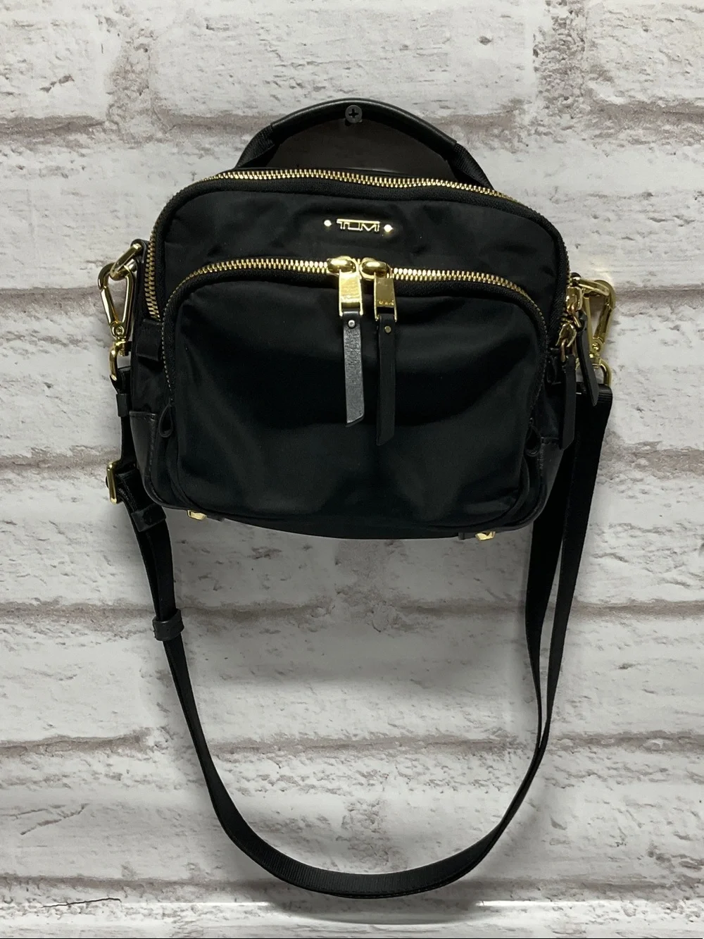 Tumi Black Nylon Crossbody with Gold Hardware Accents